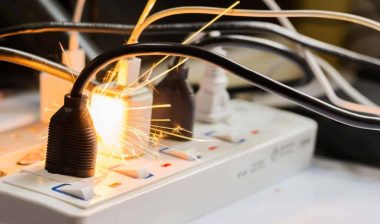 Close up of a plug sparking, representing the Hatch Baby class action.