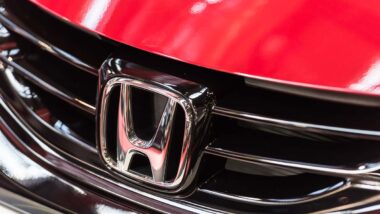 Close up of Honda emblem on a front bumper, representing the Honda class action.