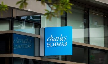 Charles Schwab sign outside building representing the cash sweeps class actions.