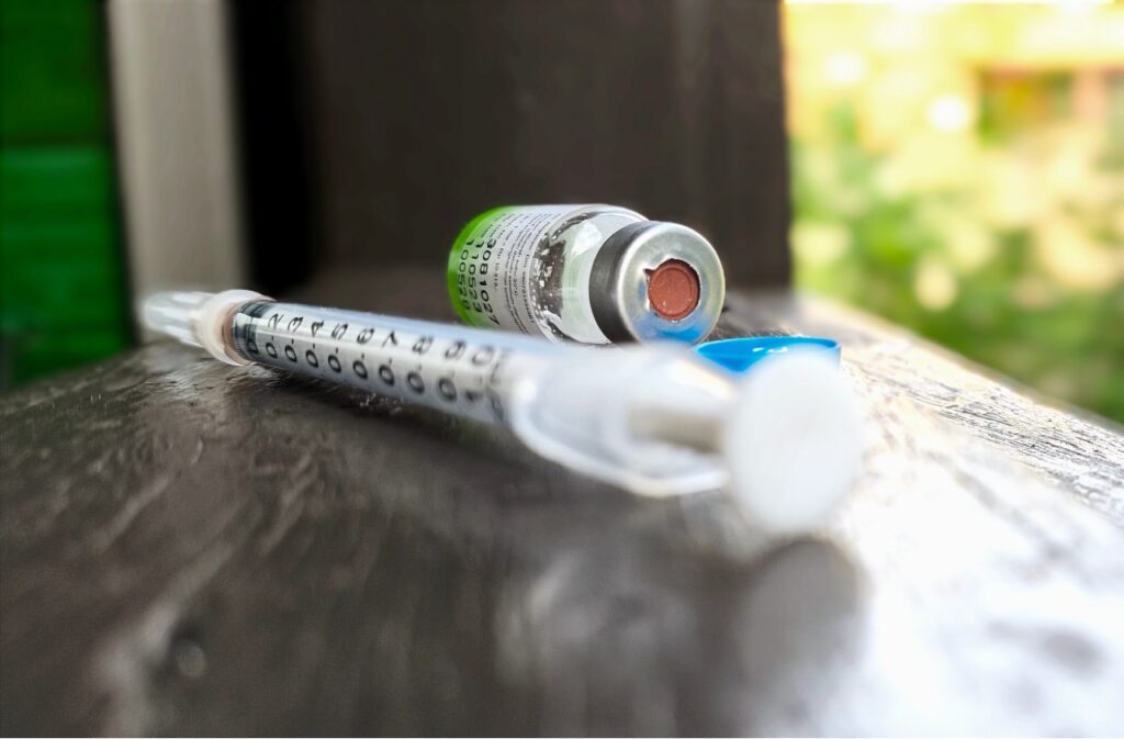 Contraceptive injection medicine bottle and syringe 