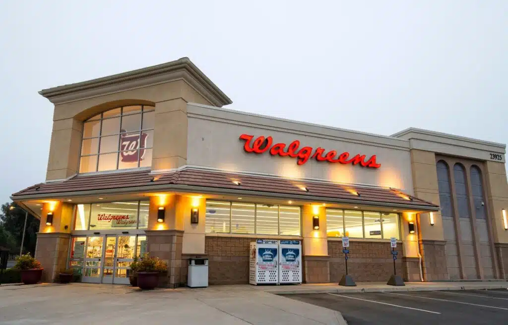 Walgreen store in the evening representing the Walgreens settlement.