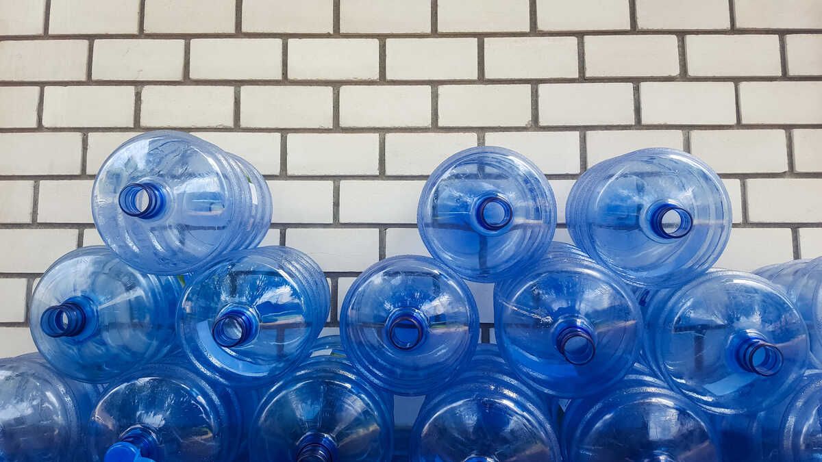 Blue water jugs representing the Real Water verdict.