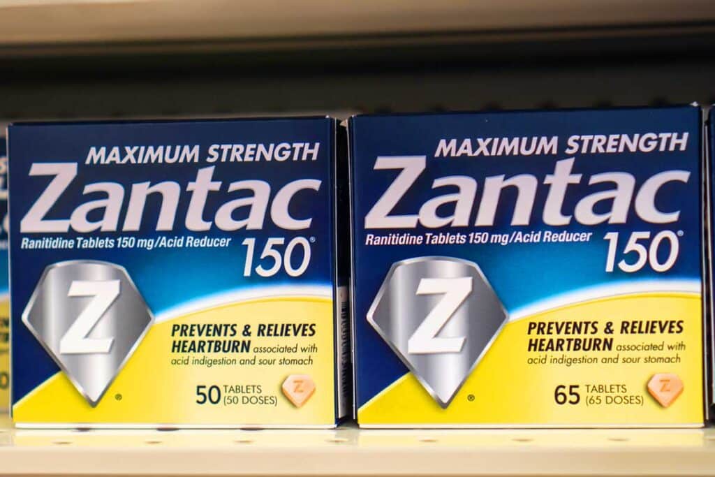 Zantac products on a supermarket shelf, representing the Zantac settlement.