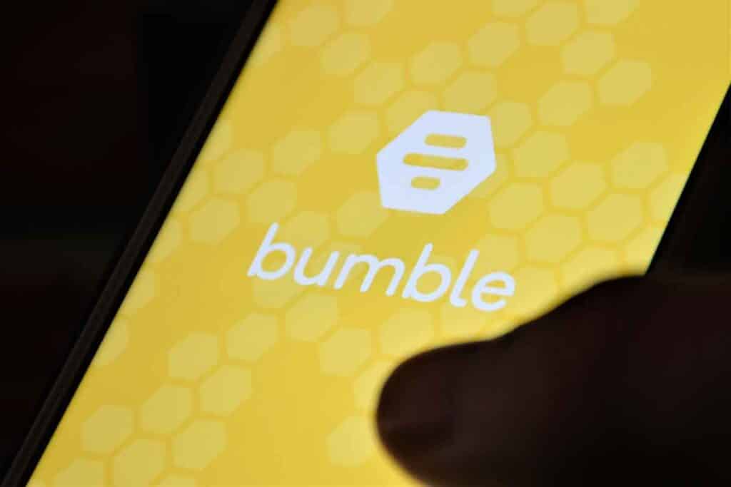 Close up of Bumble app logo displayed on a smartphone, representing the Bumble class action.