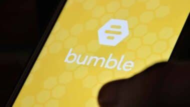 Close up of Bumble app logo displayed on a smartphone, representing the Bumble class action.