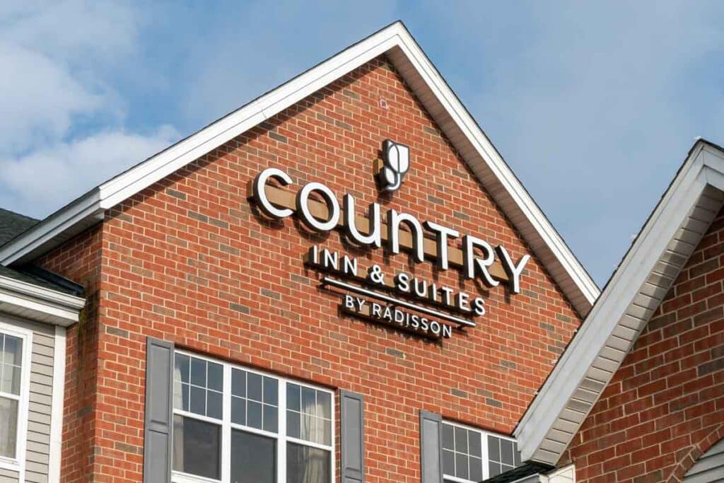 Close up of Country Inn & Suites signage, representing the Radisson data breach.