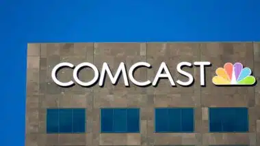 Close up of Comcast signage on a building, representing the Comcast data breach.