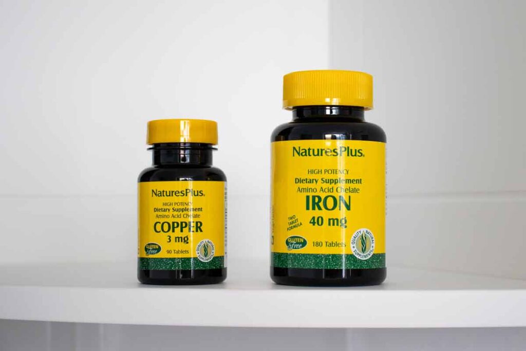 NaturePlus supplements on a shelf, representing the NaturesPlus class action.