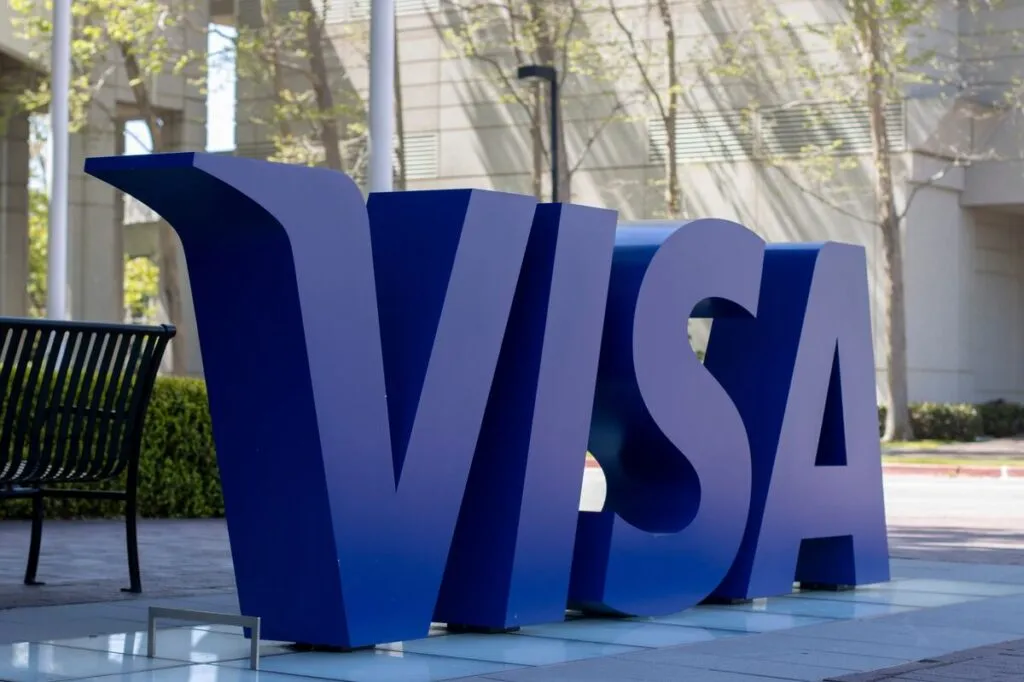 Visa credit card logo in big letters outside headquarters representing the Visa lawsuit.