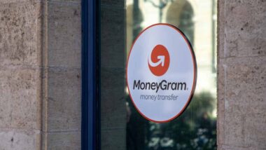 MoneyGram advertising sticker in a window, representing the MoneyGram class action.