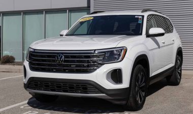 A 2024 white Volkswagen Atlas in a parking lot, representing the VW class action.