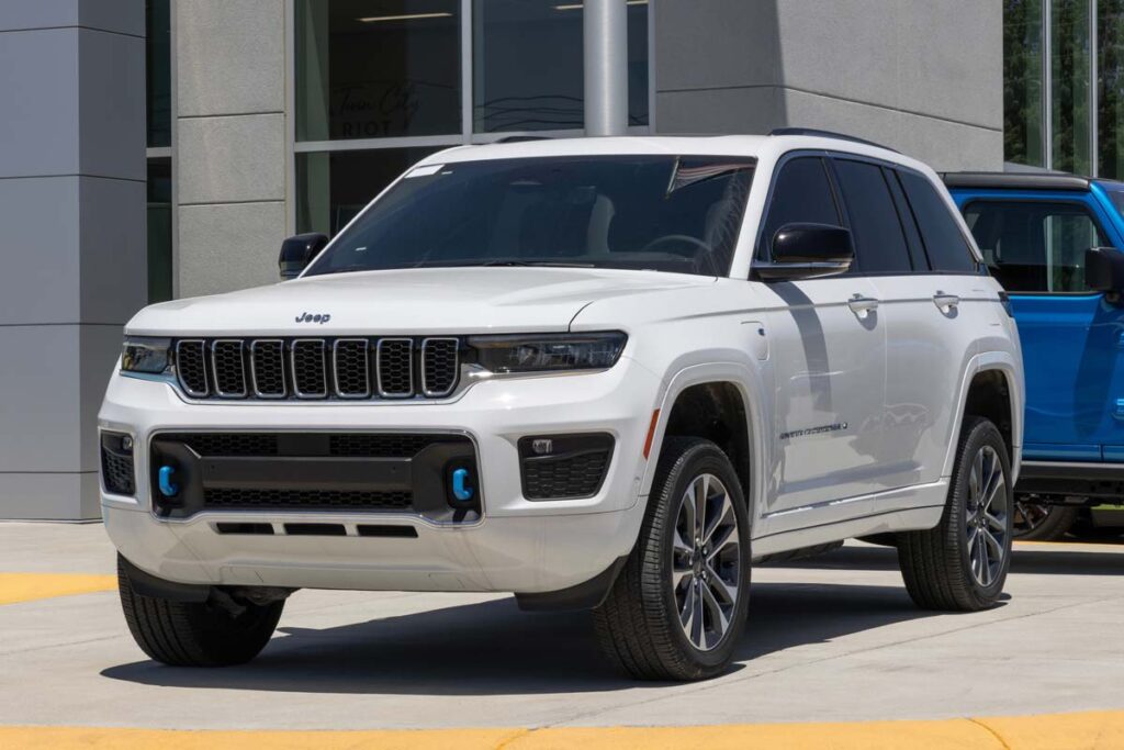 A white Jeep Grand Cherokee, representing the Jeep recall.