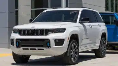 A white Jeep Grand Cherokee, representing the Jeep recall.