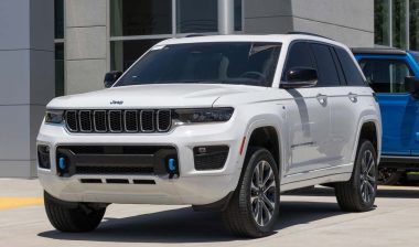 A white Jeep Grand Cherokee, representing the Jeep recall.