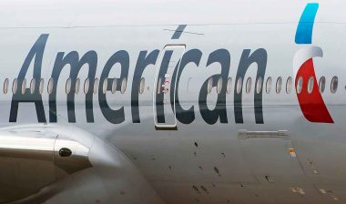American Airlines logo on the side of a plane, representing the American Airlines fine.