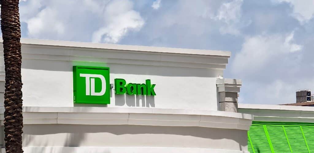 Exterior view of a TD Bank location depicting the TD Bank settlement.