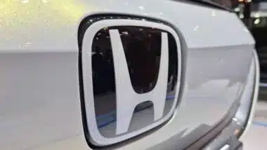 Close up of Honda emblem on a bumper, representing the Honda recall.