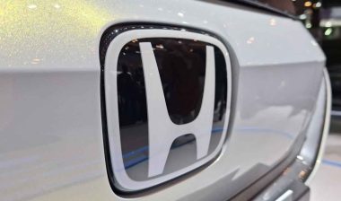 Close up of Honda emblem on a bumper, representing the Honda recall.