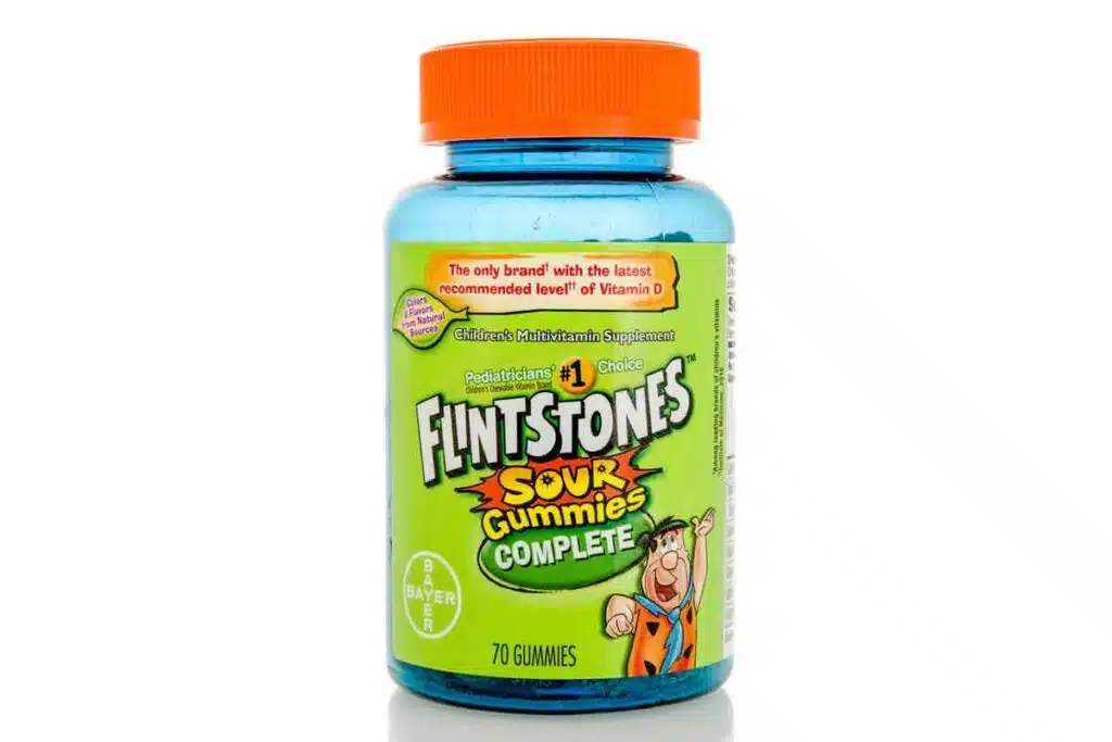 Product photo of Flintstones sour gummy vitamins, representing the Bayer class action.