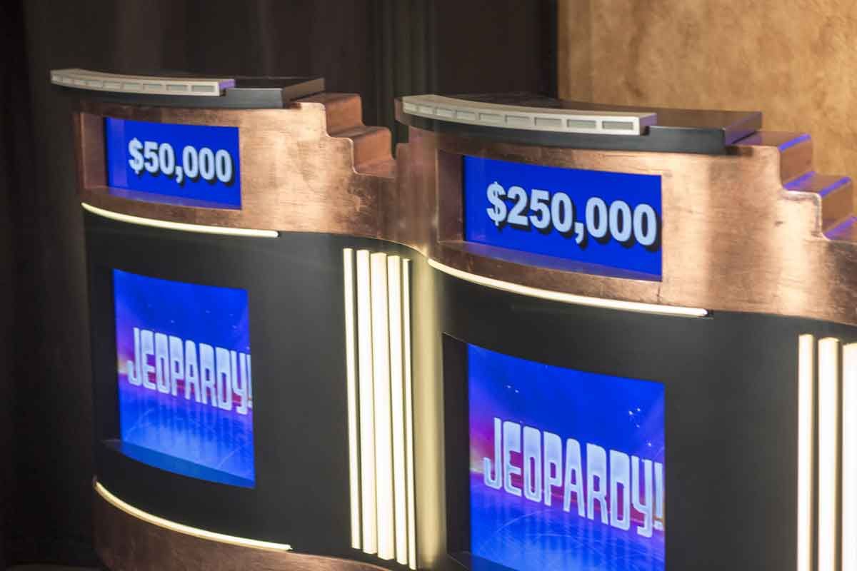 Close up of Jeopardy podiums, representing the Jeopardy! and Wheel of Fortune discrimination complaints.