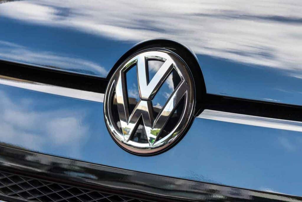 Close up of VW emblem on a front bumper, representing the VW recall.