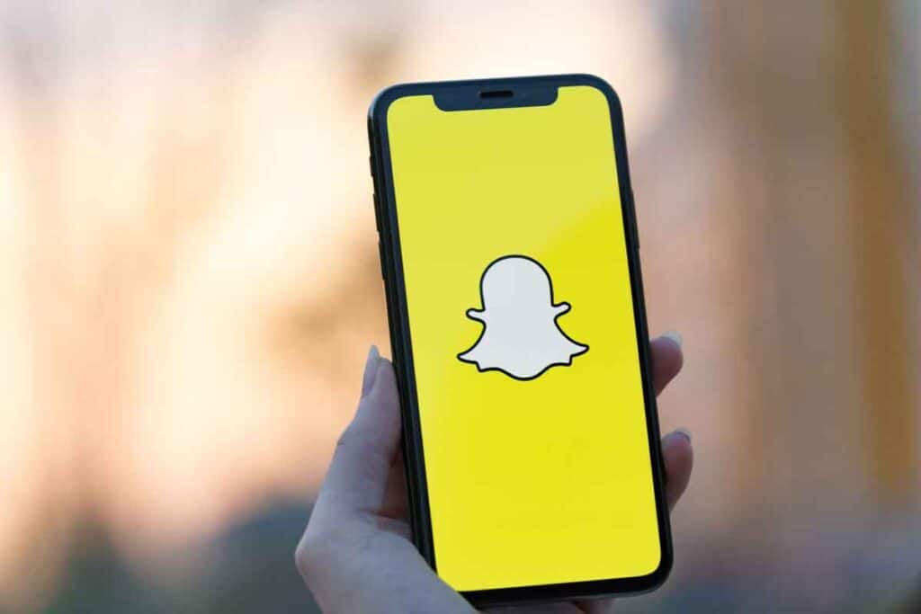 Snapchat logo displayed on a smartphone, representing the Snapchat class action.