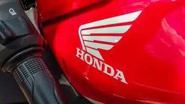 Close up of Honda logo on a motorcycle, representing the Honda recall.