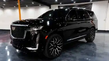 A black Escalade in a show room, representing the GM recall.