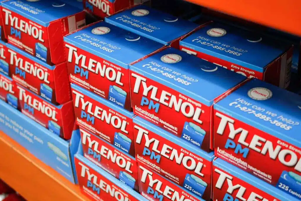 Tylenol PM products on a supermarket shelf, representing the Tylenol PM class action.