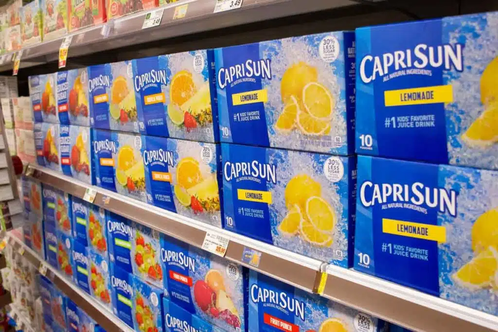 Capri-sun products on display in a supermarket, representing the Capri-Sun class action.