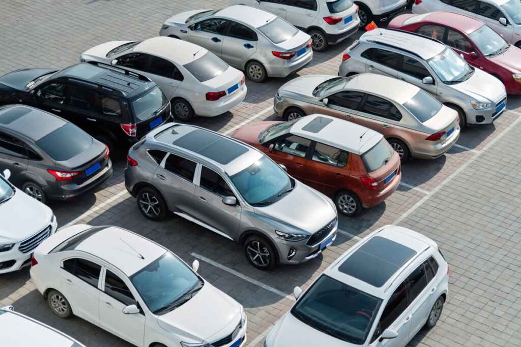 Various cars in a parking lot, representing October auto recalls.