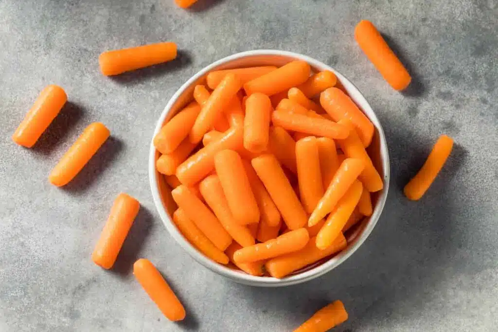 Close up of baby carrots in a bowl, representing the carrots class action.