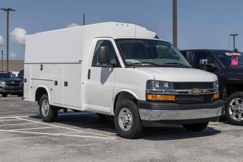 A Chevrolet Express in a parking lot, representing the Chevy and GMC recall.