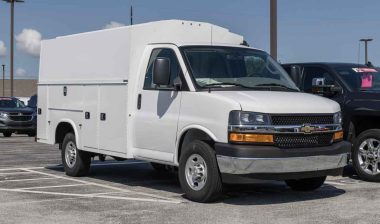 A Chevrolet Express in a parking lot, representing the Chevy and GMC recall.