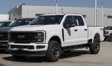 A 2024 White Ford F-250, representing the Ford recall.