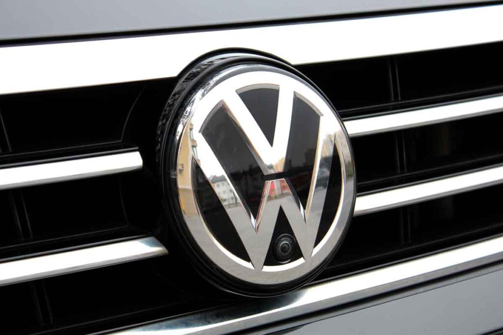 Volkswagen emblem on a front bumper, representing the Volkswagen recalls and class actions.