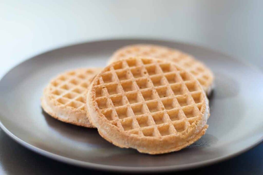 Close up of waffles on a plate, representing the waffle class action.