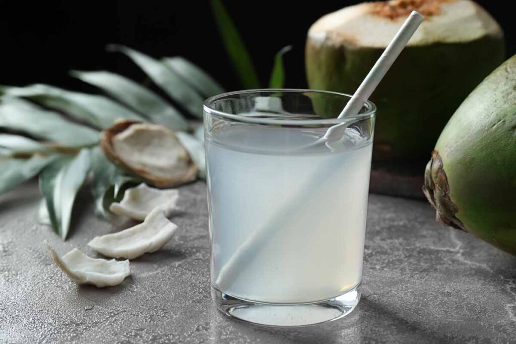 Close up of coconut water in a glass, representing the Jarritos Cocunt Water recall.