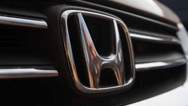 Close up of Honda emblem on a front bumper, representing the Honda class action.