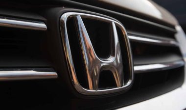 Close up of Honda emblem on a front bumper, representing the Honda class action.