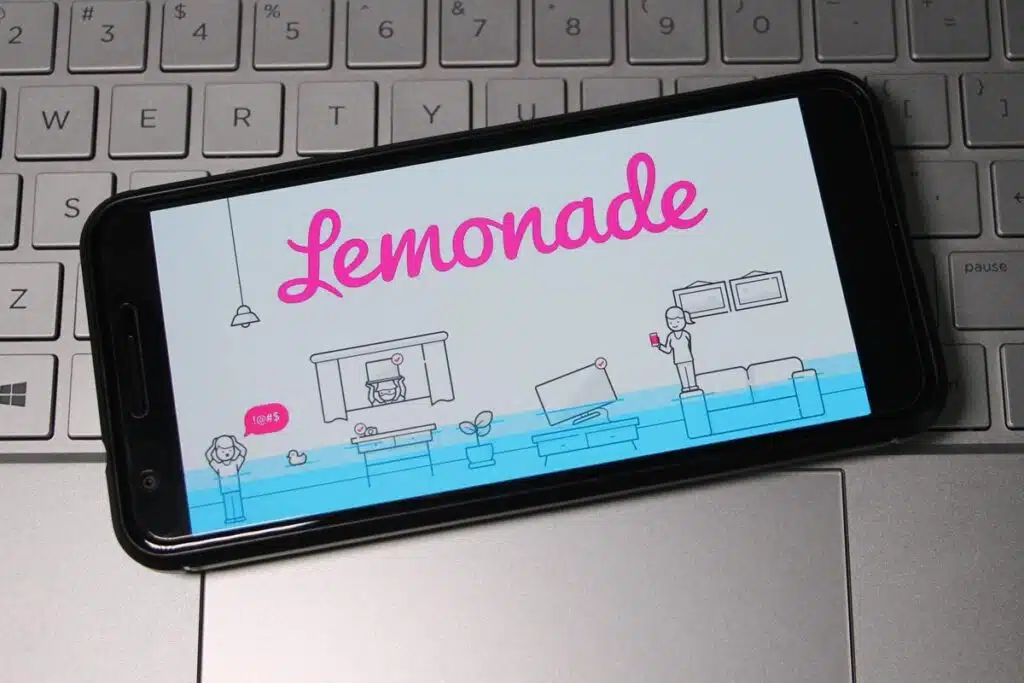 Lemonade logo displayed on a smartphone screen, representing the lemondade.com settlement.