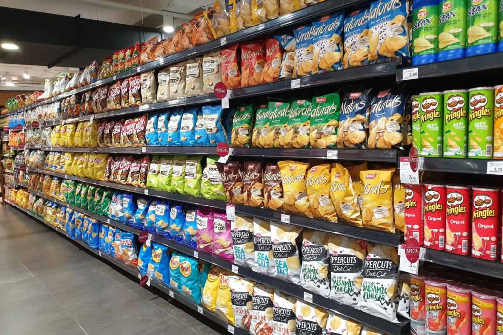A grocery store aisle, representing addictive foods.