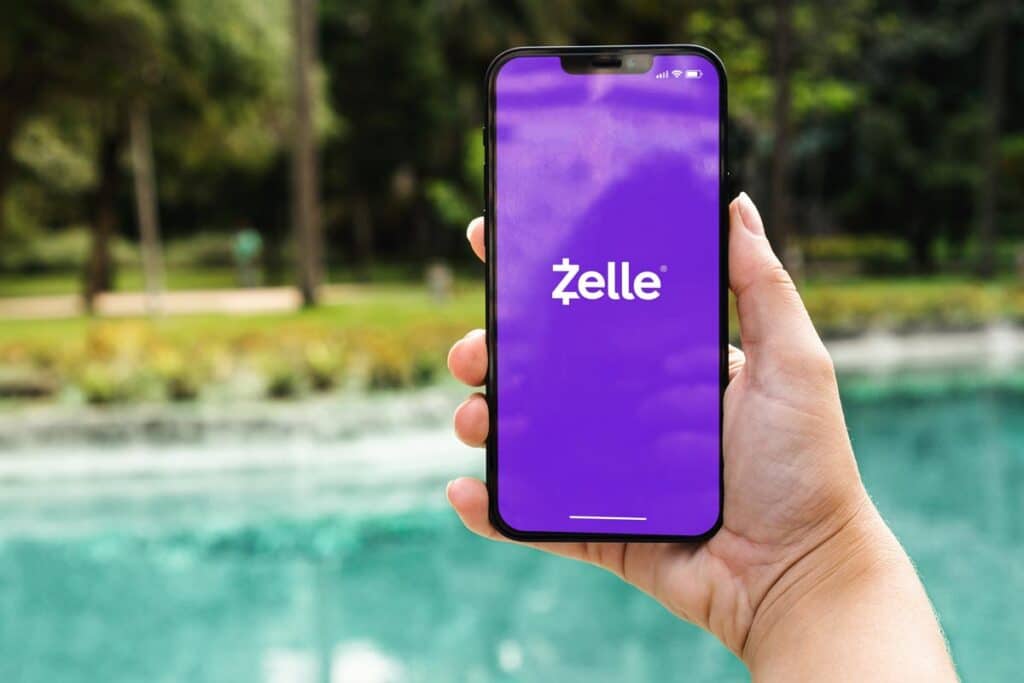 Zelle logo displayed on a smartphone screen, representing the Consumer Financial Protection Bureau lawsuit.