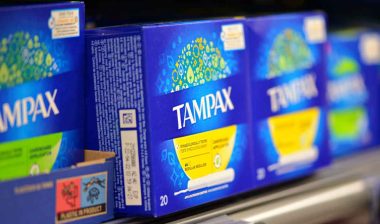 Tampax products on a supermarket shelf, representing the Tampax class action.