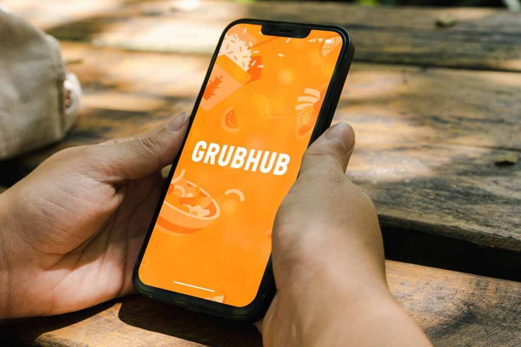 Close up of GrubHub app displayed on a smartphone screen, representing the GrubHub settlement.