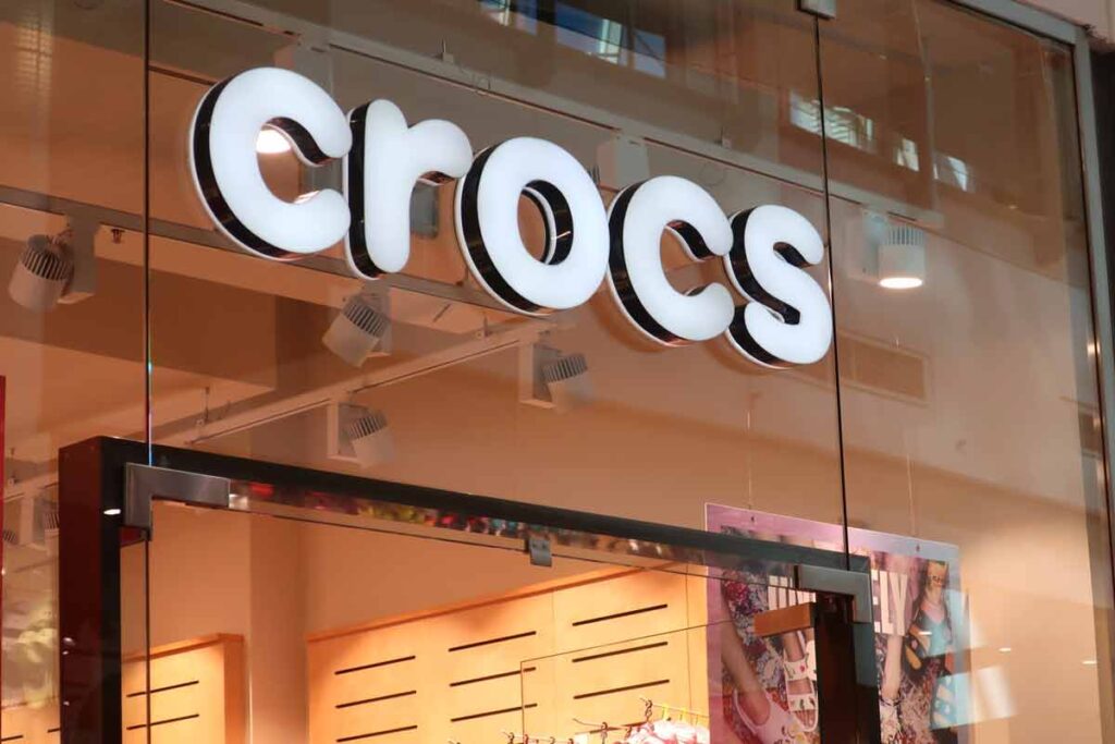 Close up of Crocs storefront signage, representing the Crocs class action.