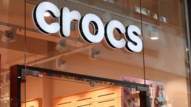 Close up of Crocs storefront signage, representing the Crocs class action.