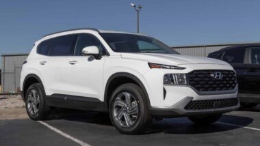 A white Hyundai Santa Fe in a parking lot, representing the Hyundai recall.