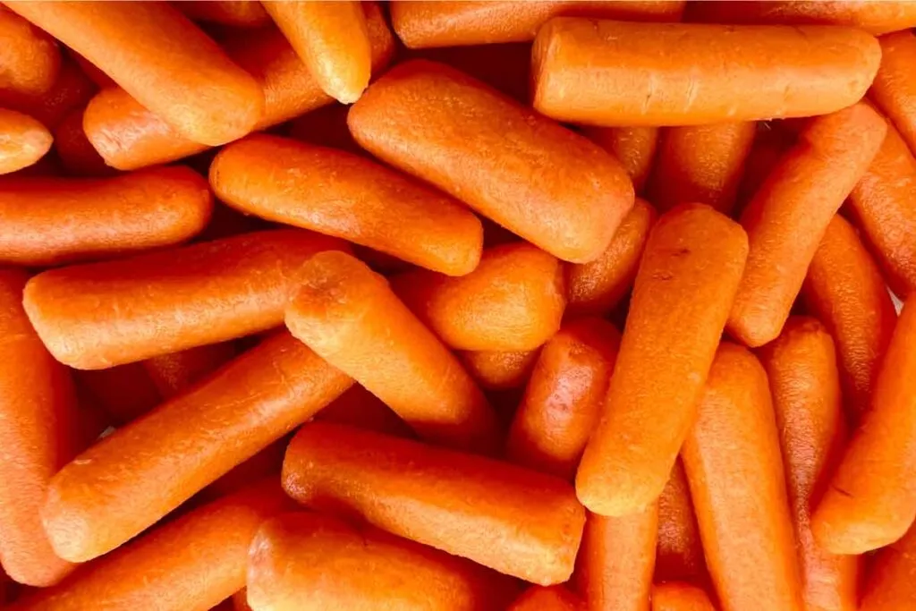 Close up of baby carrots, representing the Grimmway Farms clss action.