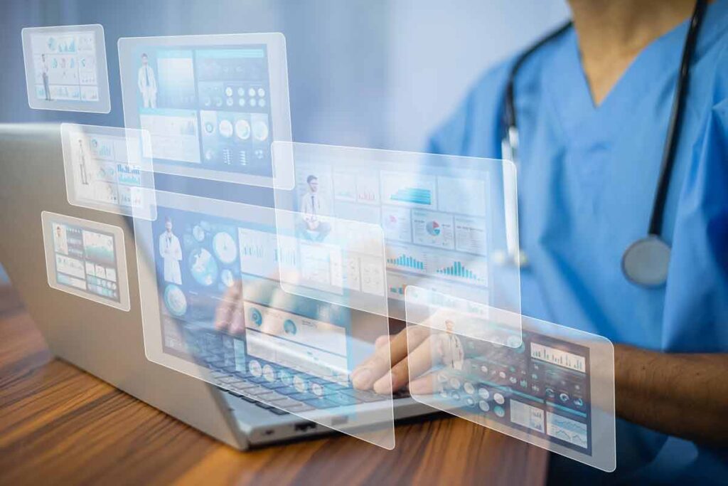 A nurse using a laptop with a patient data overlay, representing the EElekta and Northwestern Memorial Healthcare settlement.